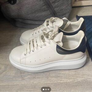 Selling for $350 us. 8 1/2 men 38.5 designer